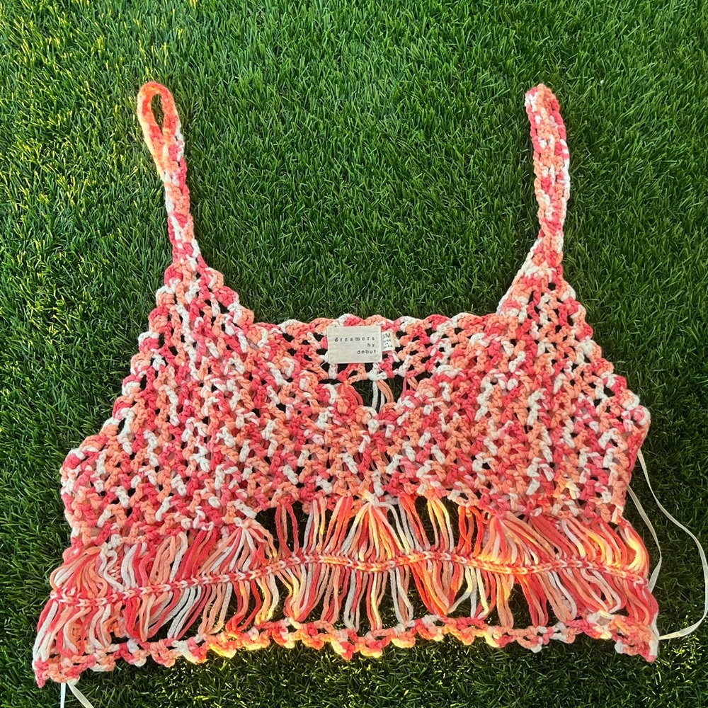 70s style orange and pink crochet crop top with a boho hippie vibe.